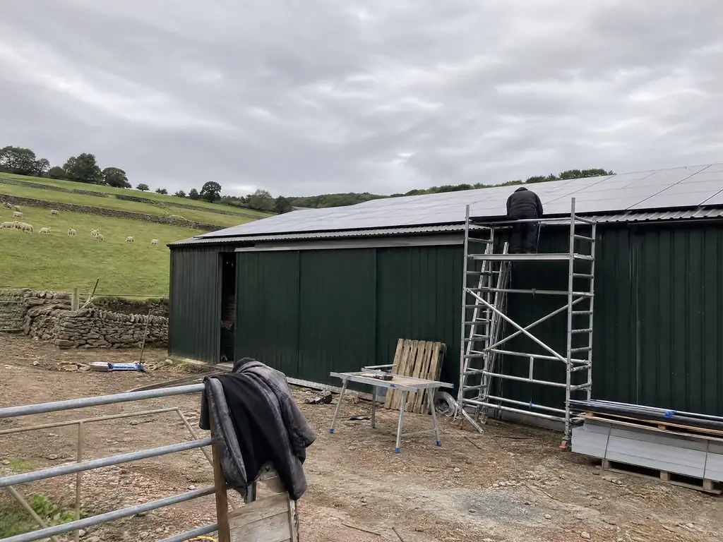 Solar panels on a farm shed roof in Derbyshire, Derby