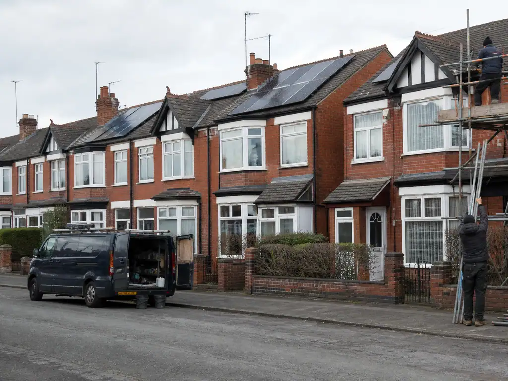 Solar panels on red-brick Victorian terraces in Burton upon Trent